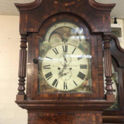 A 19 century mahogany moon roller long cased clock. Approximately 245cm tall.