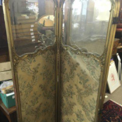 A Gilt panel with embroidery and glass design. 182cm tall Postage category D