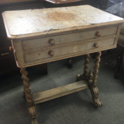 A Victorian satin burr walnut occasional table with side drawers and freeze drawers on barley twist supports.