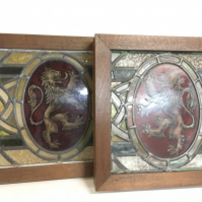 Two lion design stain glass windows, dimensions 40x40cm this lot cannot be posted