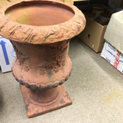 A Large Victorian terracotta urn. 50cm tall and 35cm wide.