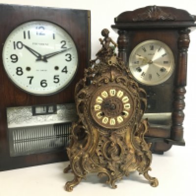 A brass ornate mantle clock (40cm tall) and two wall clocks, President and Holly. This lot cannot be posted