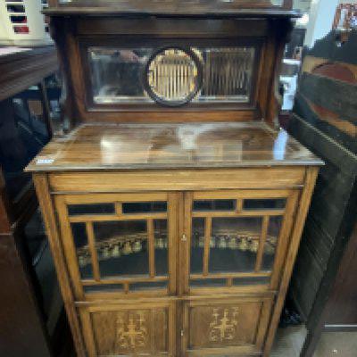 An Edwardian inlaid music cabinet with mirrored top section, 147cm x 76cm x 39cm