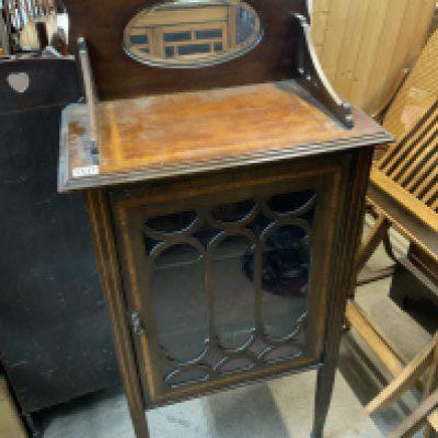 A small Edwardian music cabinet, 131cm x 58cm x 34cm.