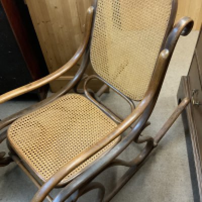 A 19thC bentwood cane rocking chair. (D)