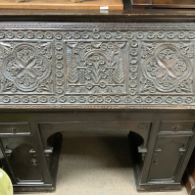 A large carved oak drop front bureau, 123cm x 120cm