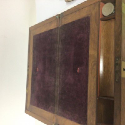 A Victorian walnut and brass bound writing slope with a well fitted interior.