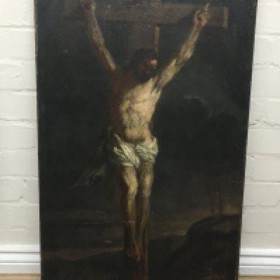 An oil on canvas depicting Jesus on the cross. Measuring 49cm x 84cm approximately
