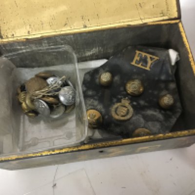 A collection of military cloth epaulets medal ribbons and other associated military items. NO RESERVE