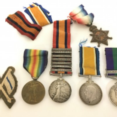 A Medal Group with The Second Boer War & WW1 medals presented to Pte H.Lodge. Essex Reg including a Queens South Africa medal with seven clasps, 1914-15 star, war medal, victory medal and a General Service medal presented to Gnr.A.E Lodge. R.A. Postage category A