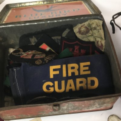 A collection of Military Cloth badges medal ribbons and associated items including Royal Navy Badges II world war Civil Defence badges American Forces cloth badges and Essex Regiment cloth badges and interesting collection.