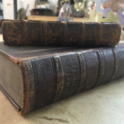 Two leather books - Baileys dictionary and The independent Whig