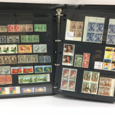 Eight albums of Australian postage stamps and a catalogue. Shipping category D.