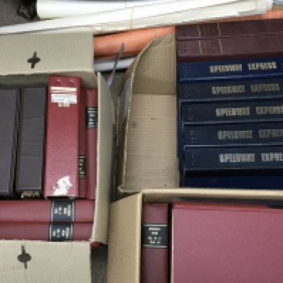 A collection of vintage speedway memorabilia including speedway express magazines, speedway news volumes and posters