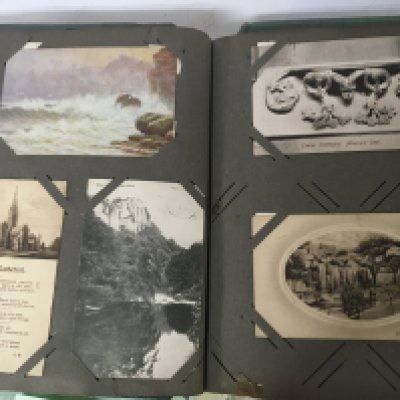 Four Vintage postcard albums containing postcards from the early 20th century onwards Greeting Cards Birthday Cards landmarks etc (4)
