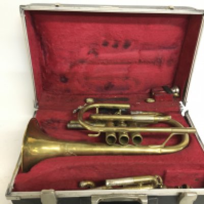 A cased Lark trumpet, Made in China.