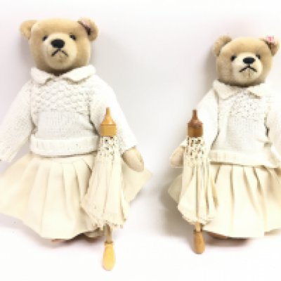 A pair of Steiff Nora 1912 titanic bears with umbrellas. Postage category C