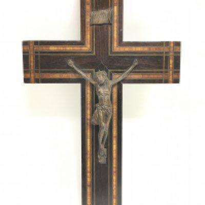 A crucifix inlaid wooden cross with a bronze figure of christ, dimensions approximately 25x15cm. Postage category C