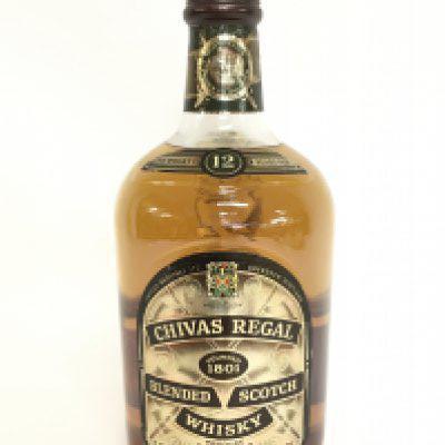 A 12 year old 1.75l bottle of Chivas Regal blended whisky , this lot cannot be posted.
