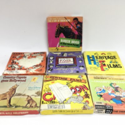 Vintage 8mm films including Walt Disney The Dwarfs Dilemma, Coyote goes Hollywood, Heritage Films Little Lulu in Loose in a Caboose. Postage category B