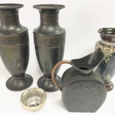 A pair of Dutch copper vases and arts and crafts jug along with a Doulton Lambeth vase and a silver bowl.