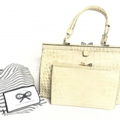 An Anya Hindmarch crocodile skin designer bag. Postage category C