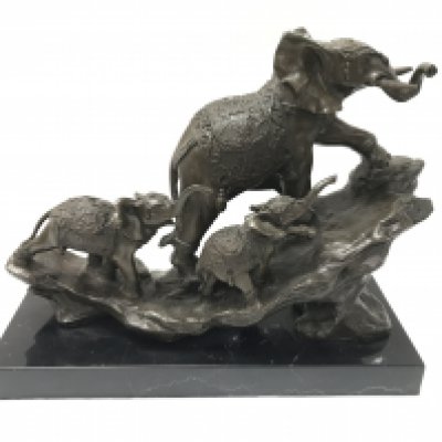 A modern cast bronze elephant figure on a stone base. 30cm wide by 25cm tall.