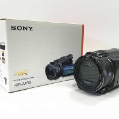 A boxed Sony 4K Handycam FDR-AX53. Postage category C