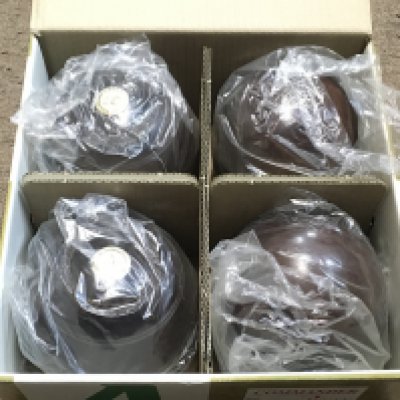 A boxed set of Almark lawn bowls. Postage category C