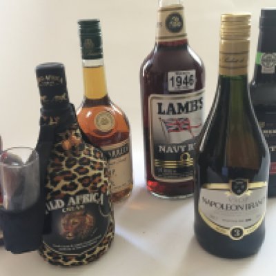A large bottle of Lambs Navy Rum Three Barrels French brandy Napoleon Brandy port and other spirits (6)