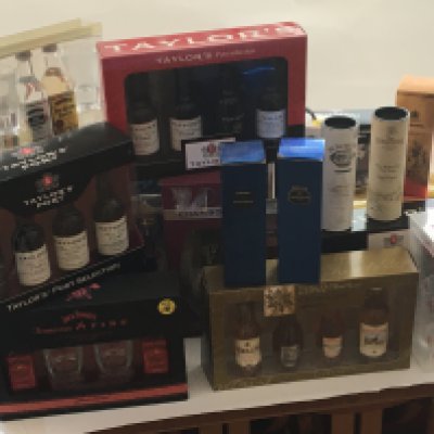 A box containing a large collection of Small presentation whisky Taylors Port Jack Daniels and many others