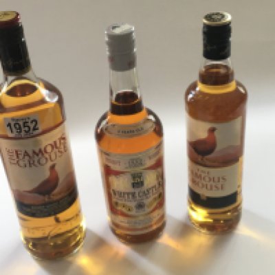 Two bottles of Famous Grouse blended scotch whisky 1l and 70cl and a bottle of White Castle five year old (3)