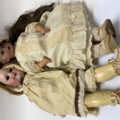 2 early porcelain headed dolls. Gebr&uuml;der Ohlhaver Dolls 1912-1928 22-10, Together with an Armand Marseille -390n. (Condition issues with both) postage cat D, unable to post.