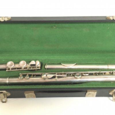 A vintage cased F.Buisson flute. Postage category C