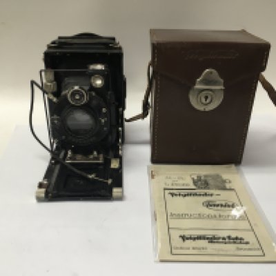 A rare Voigtlander plate camera with original instructions and leather carry case.