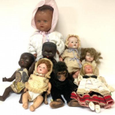 A collection of vintage dolls and soft toys to include a small Japanese doll. (C)