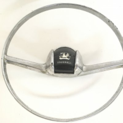 A Vintage Chrome Vauxhall steering wheel, 25.5cm in diameter. postage category C