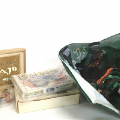 A collection of vintage boxed games including Slide Abacus, Timba, Tangram Bajo, Playworn farm animals and tractors. Postage category C