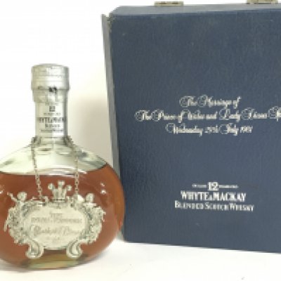 A boxed bottle of 12 year old Whyte and Mackay Scotch whisky Royal Wedding edition. This lot cannot be posted