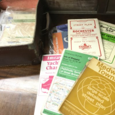 A collection of vintage keys and maps
