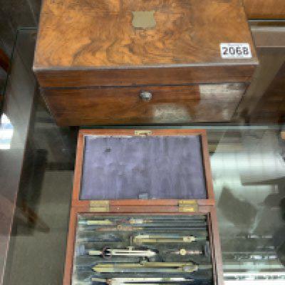 A Victorian Walnut work box, A cased drawing set. (B)