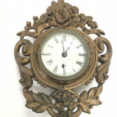 A late 19th century painted metal wall clock 28cm. This lot cannot be posted