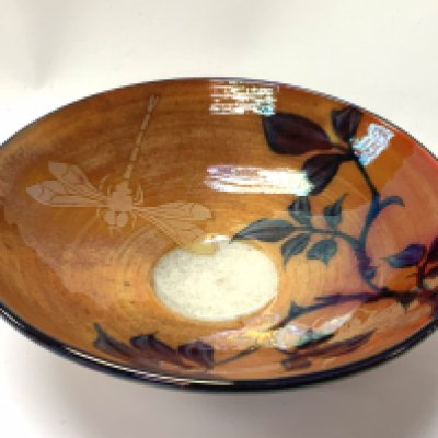A Jonathan Chiswell-Jones lustre porcelain bowl, decorated in silver lustre with orange ground, dragonfly and foliage, 16cm x 5.5cm. NO RESERVE