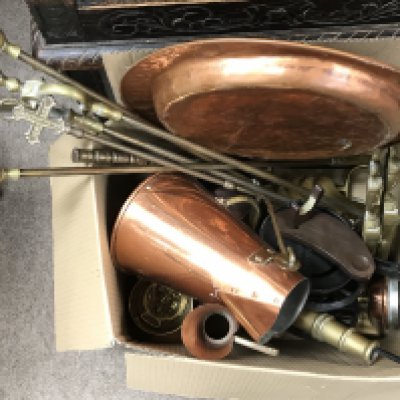 A quantity of brass and copper ware and ornaments including fire irons, coal bucket, brass and cast iron cannon .this lot cannot be posted. NO RESERVE
