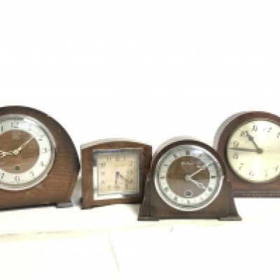 A Collection of mid 20th century mantle clocks including Enfield, Bentima etc. This lot cannot be posted. NO RESERVE