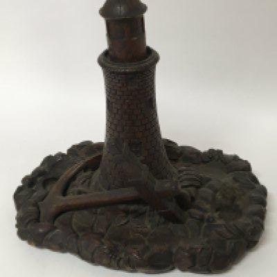 A Late Victorian carved wood pen tray in the form of a lighthouse with an anchor and other treen carved wood ornaments. Hight 32cm. NO RESERVE