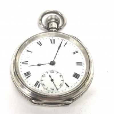 A silver pocket watch. Winds and runs. 50mm case.- NO RESERVE