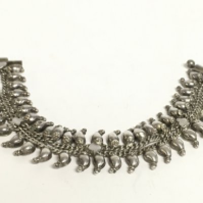 An Indian silver mango bracelet. Postage category A- NO RESERVE