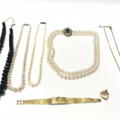 A mixed collection of necklaces and other items including rolled gold locket. NO RESERVE