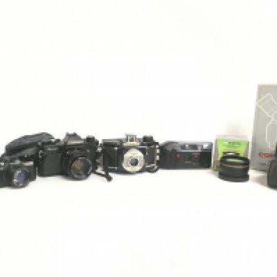 Vintage cameras and accessories including Pentax Auto 10, Topcon Unirex, Coronet 66, Yashica J2. This lot cannot be posted. NO RESERVE